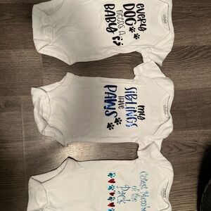 3 newborn and 1 3 month baby onesies